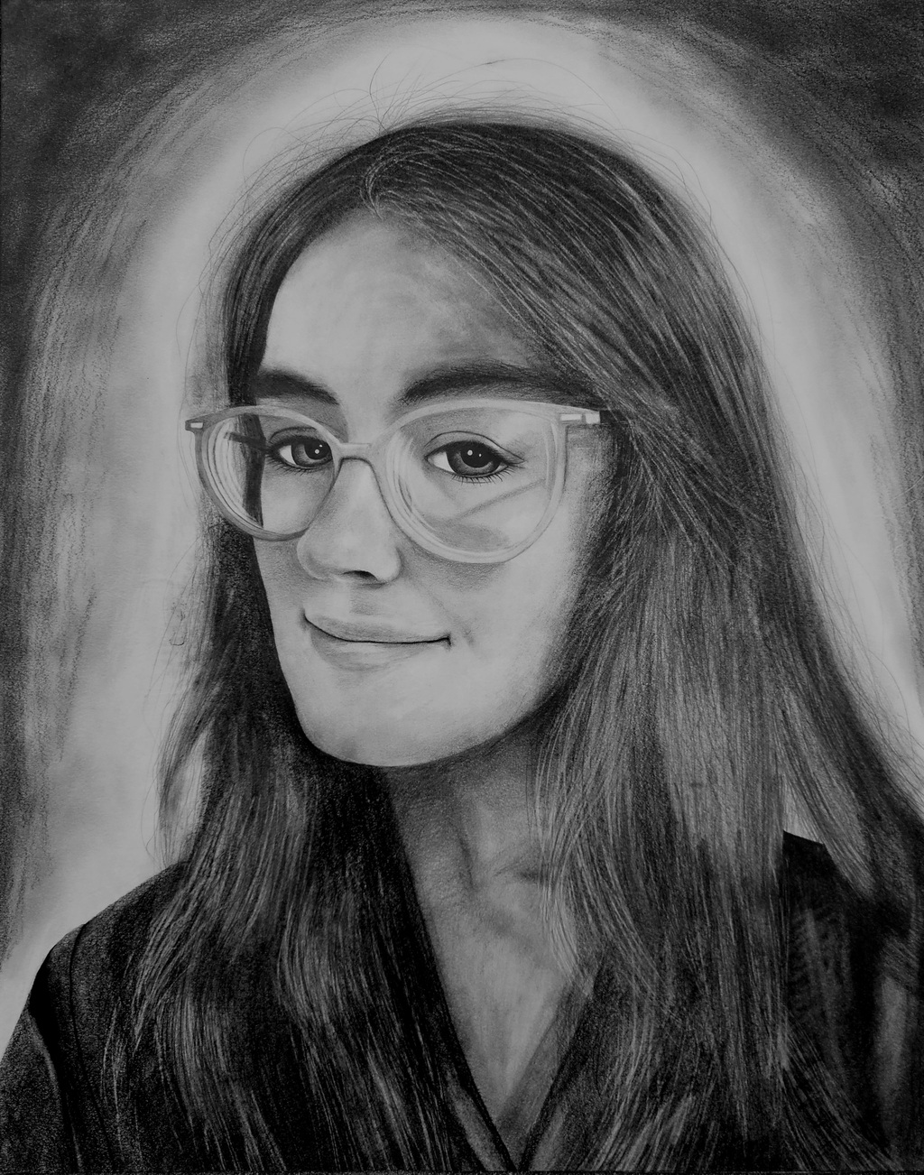 A realistic graphite drawing of the author. 